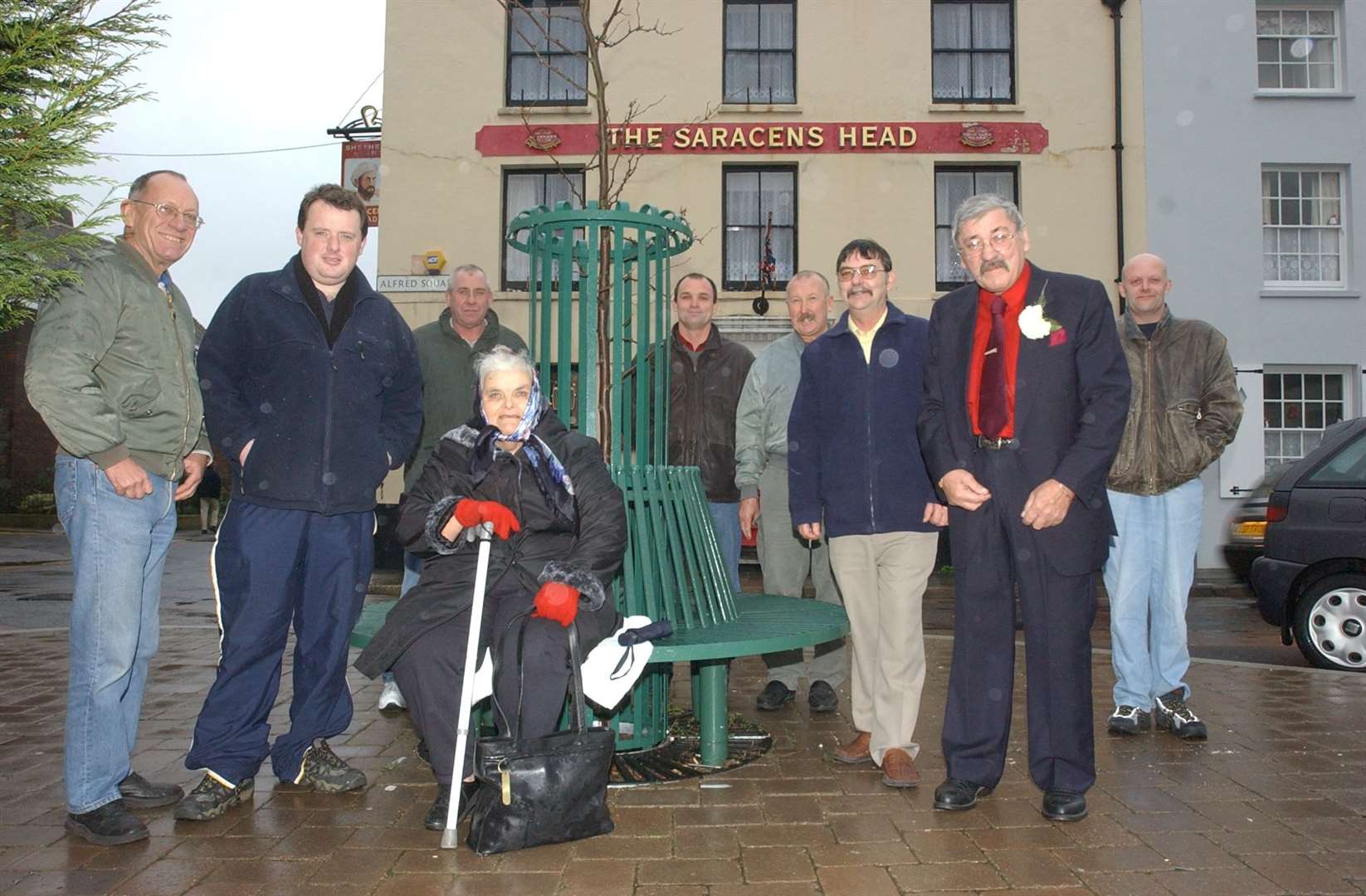 A group of fundraisers with the pub in the background. Picture: Mike Waterman