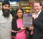 LANDMARK: Harry and Charlie Goraya receive their plaque from Paul Lansdale