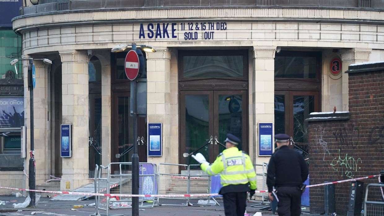 Police officers at the Brixton O2 Academy the day after many were injured in a crush. Picture: PA