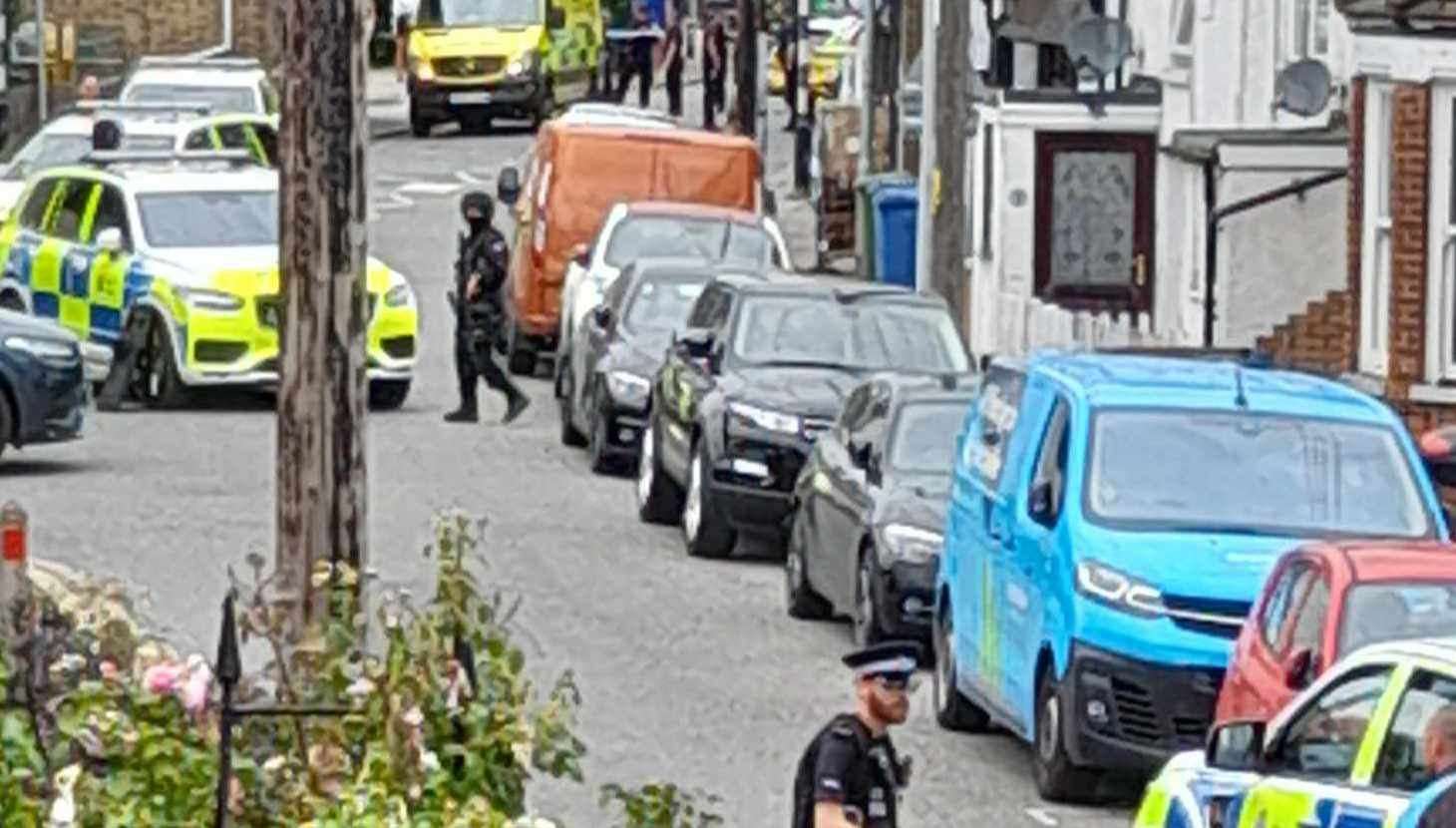 Police, including armed officers, in Eastchurch High Street