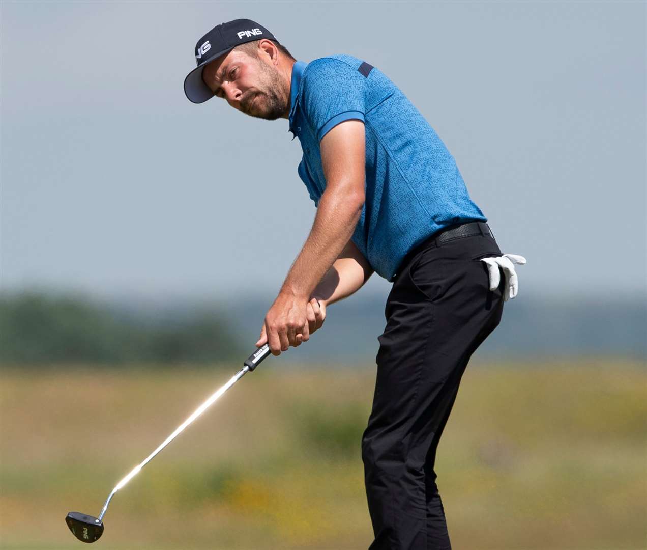 Rochester and Cobham's Jordan Godwin putts on the 13th green. Picture: Ady Kerry