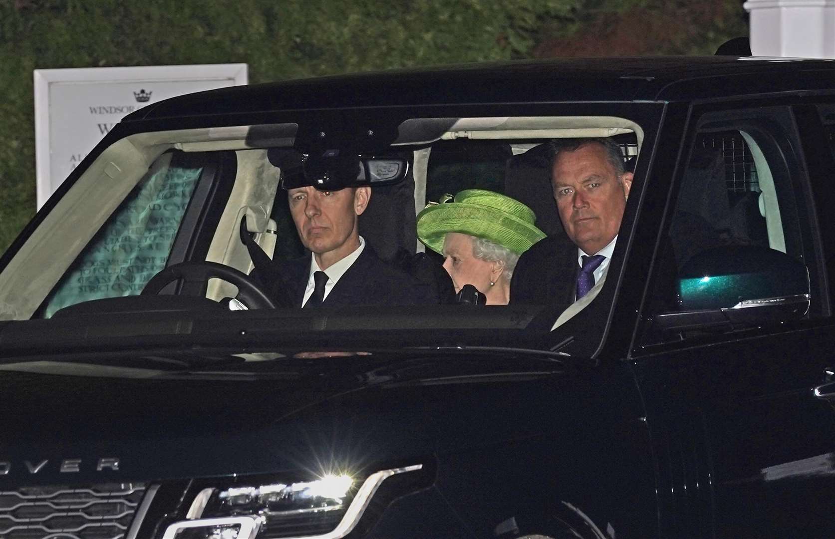 Queen Elizabeth II leaves Windsor Great Park in Berkshire following a rare royal double christening (Steve Parsons/PA)