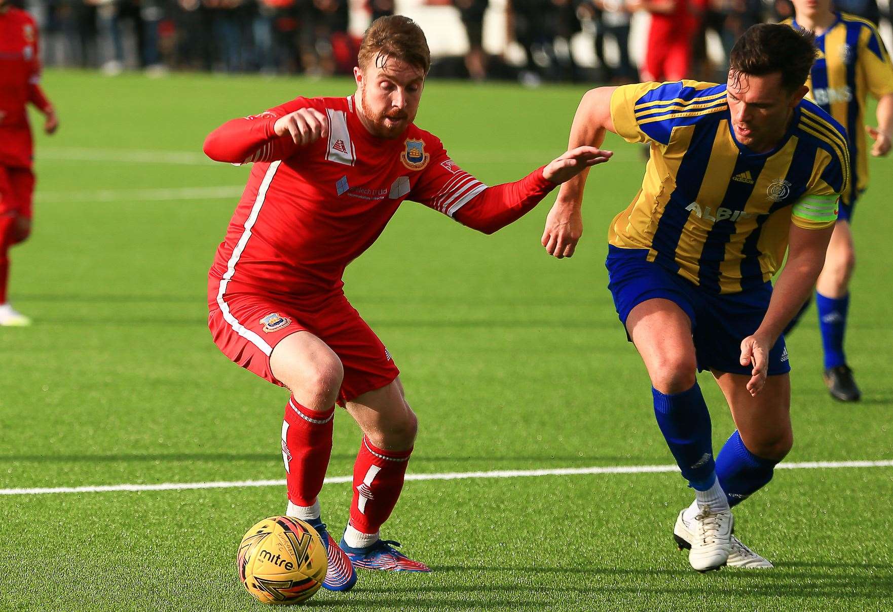 Whitstable's Jake Mackenzie takes on Billy Parkinson in their 1-0 Kent Senior Trophy loss to Stansfeld - what proved Richard Styles' last match in charge. Picture: Les Biggs