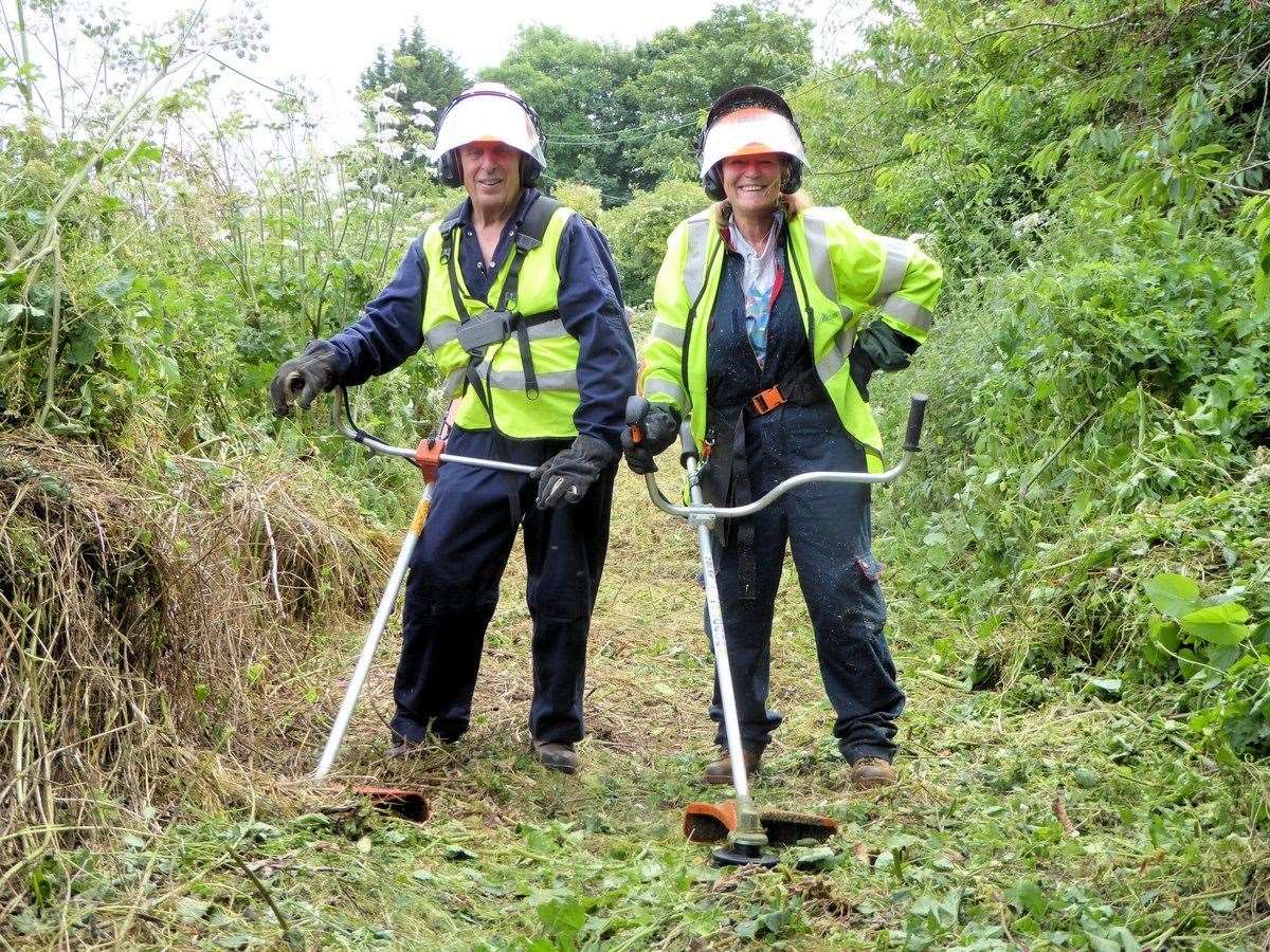 Averil and Steve Brice clearing a path near Betteshanger