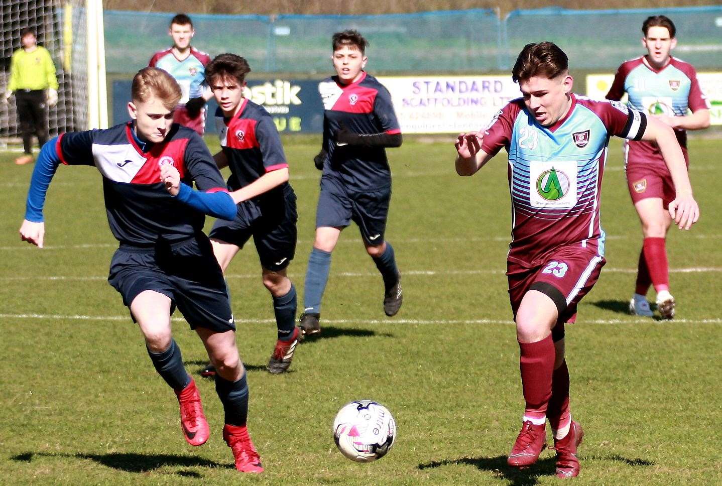 Wigmore Youth under-18s (claret) and Hempstead Valley under-18s give chase during the John Leeds Final. Picture: Phil Lee FM8027202