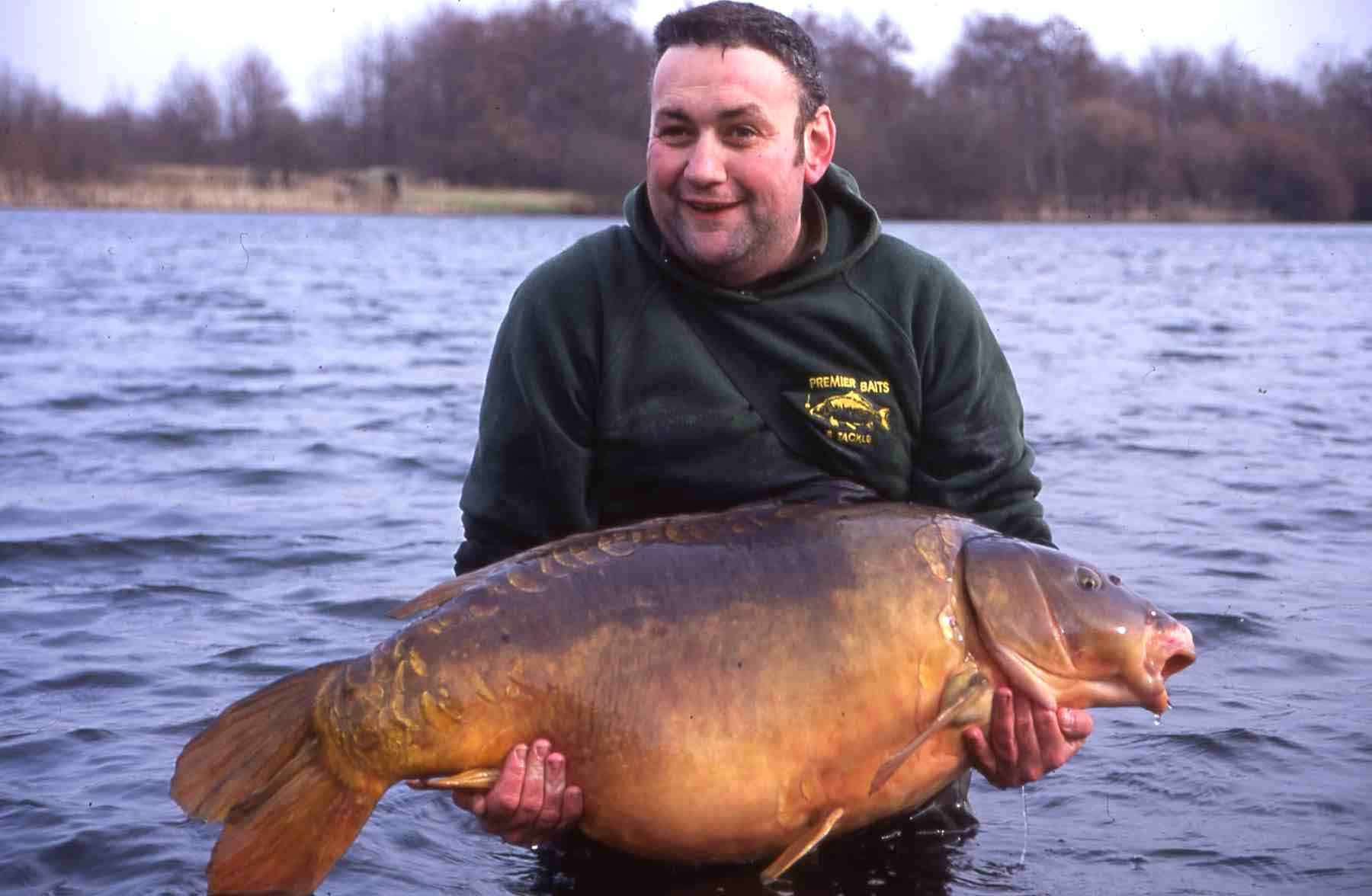 Jon Pack, from Ashford, was one of the lucky few to catch Britain's largest carp. Picture: Niamh Arnett/Mid Kent Water