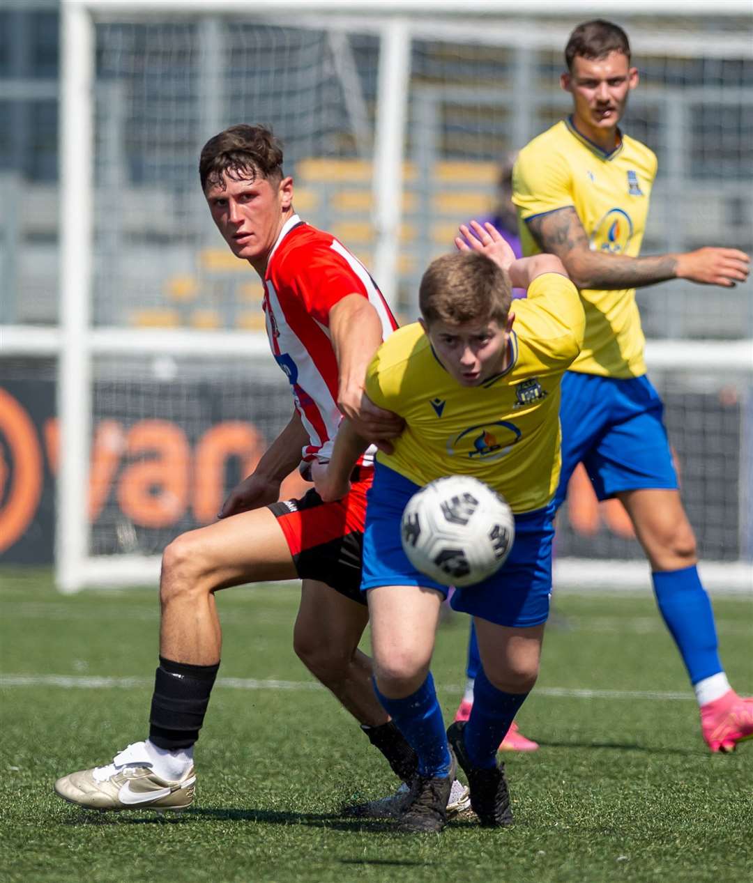 DFDS Kent Sunday Junior Trophy action between Brewmaster High Halden (red/white) and Dynamo Sutton (yellow). Picture: PSP Images/Ian Scammell