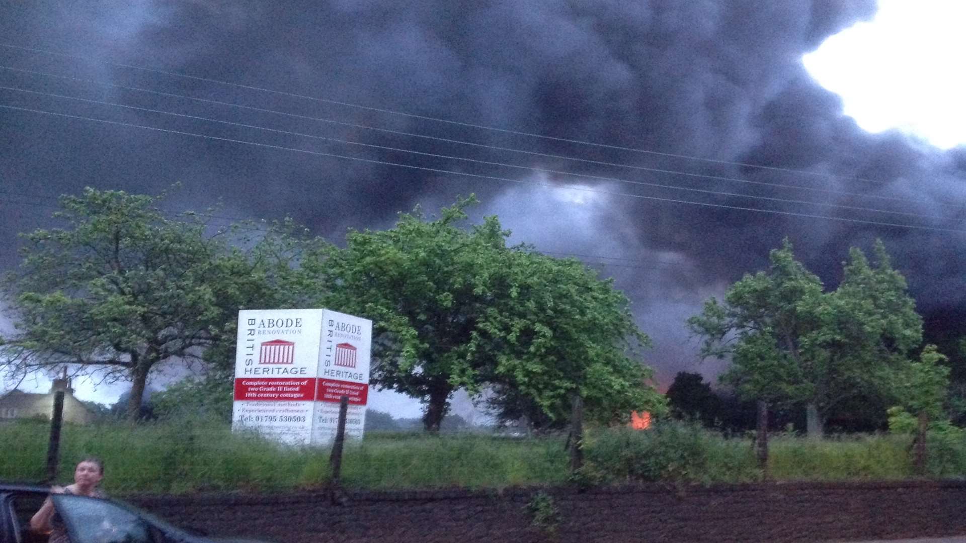 Smoke billows into the sky amid a huge fire at Faversham Linen Services