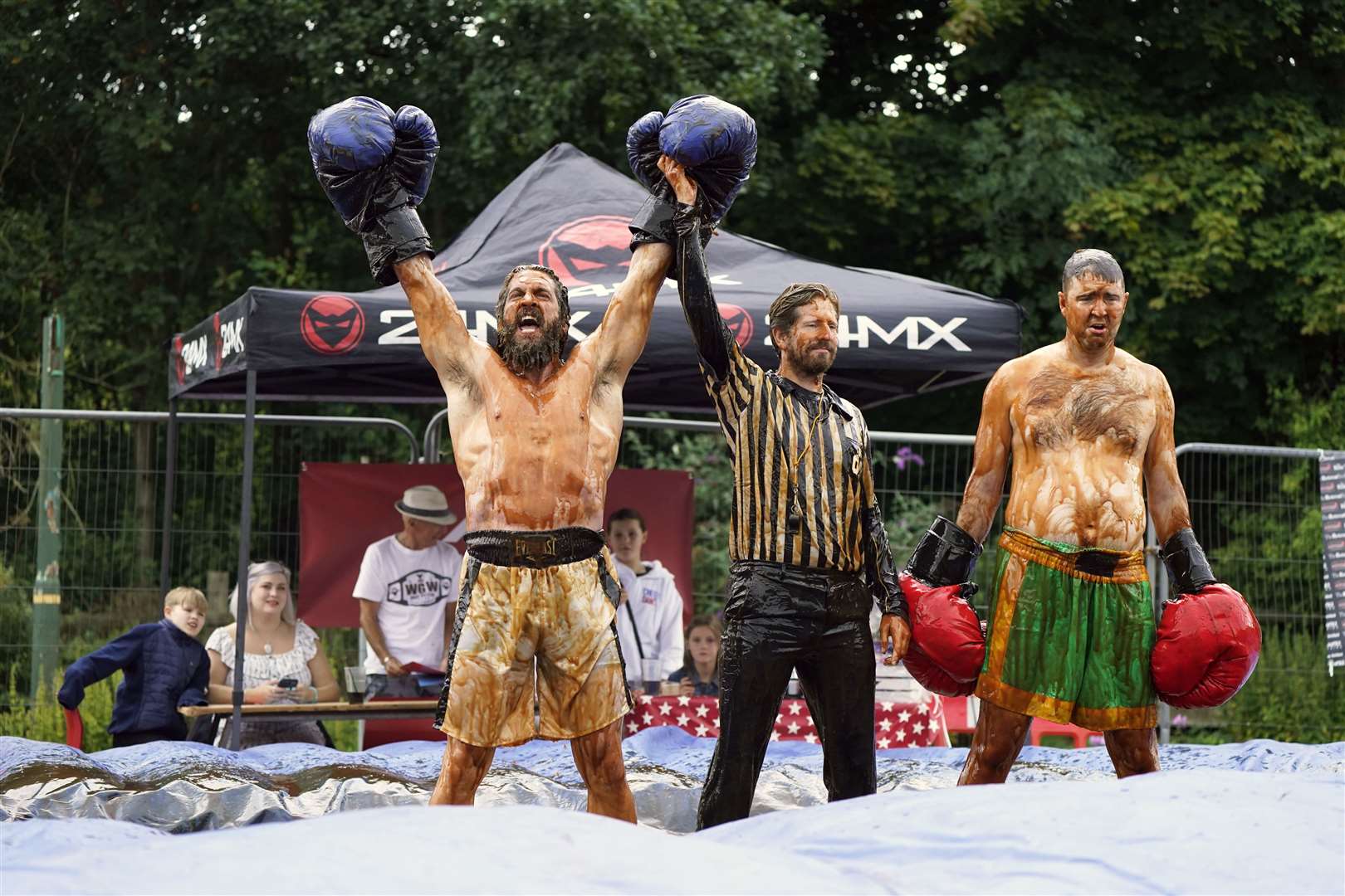 A fun boxing match was held in the gravy-filled ring before the wrestling began (Danny Lawson/PA)