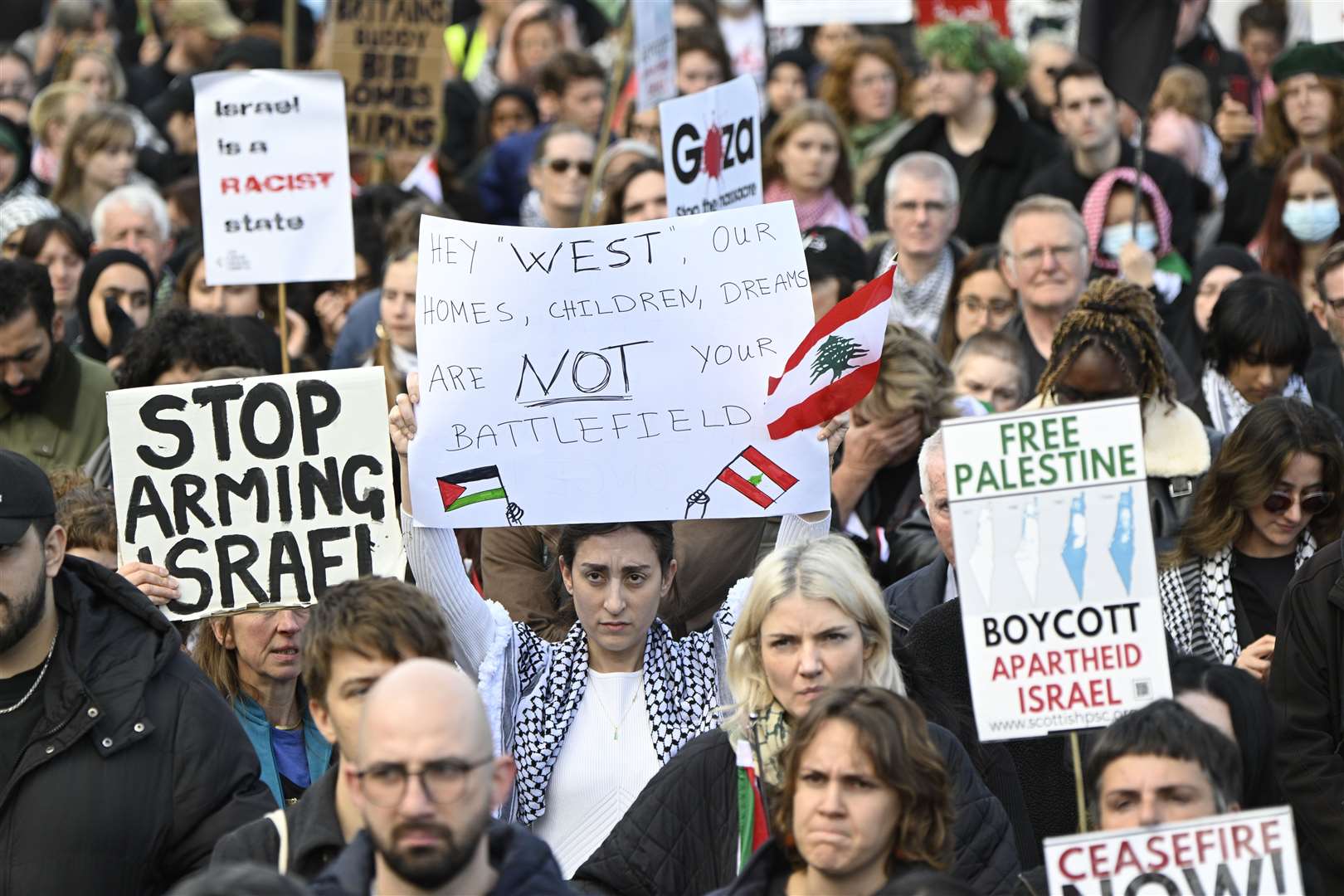 A silent march was held to commemorate all civilians killed (Lesley Martin/PA)