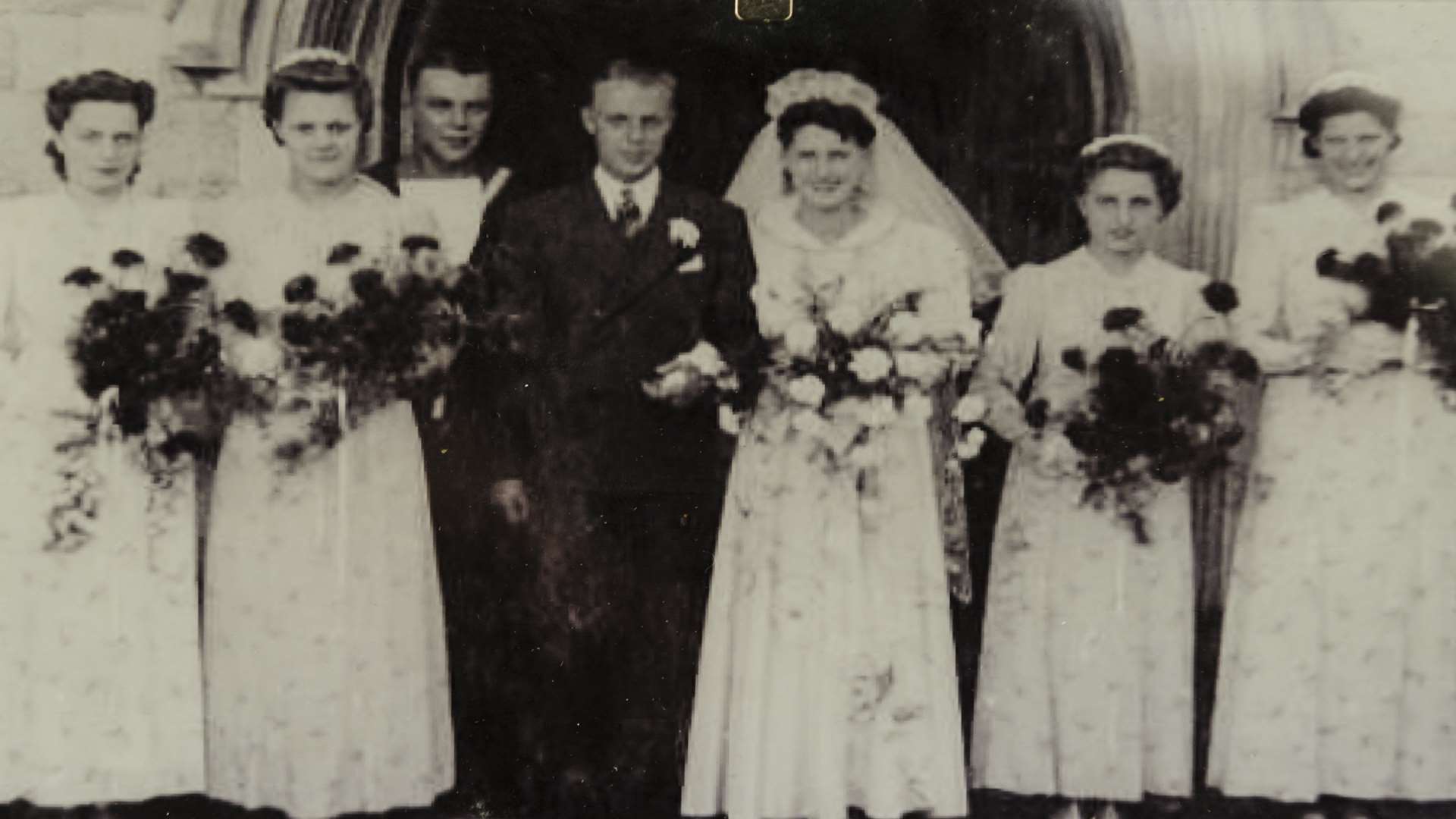 Peter and Dora, with the best man and bridesmaids, outside St Botolph's Church, Northfleet