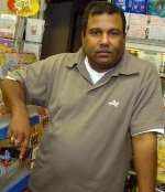 Selliah Maheshwaran in the general store he owns