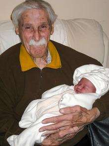 Ernest Beckett with his granddaughter Anaia who is the first girl to be born in his family since 1898.