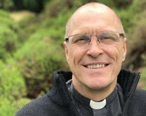 Father Robert Lane, priest of Borden parish church