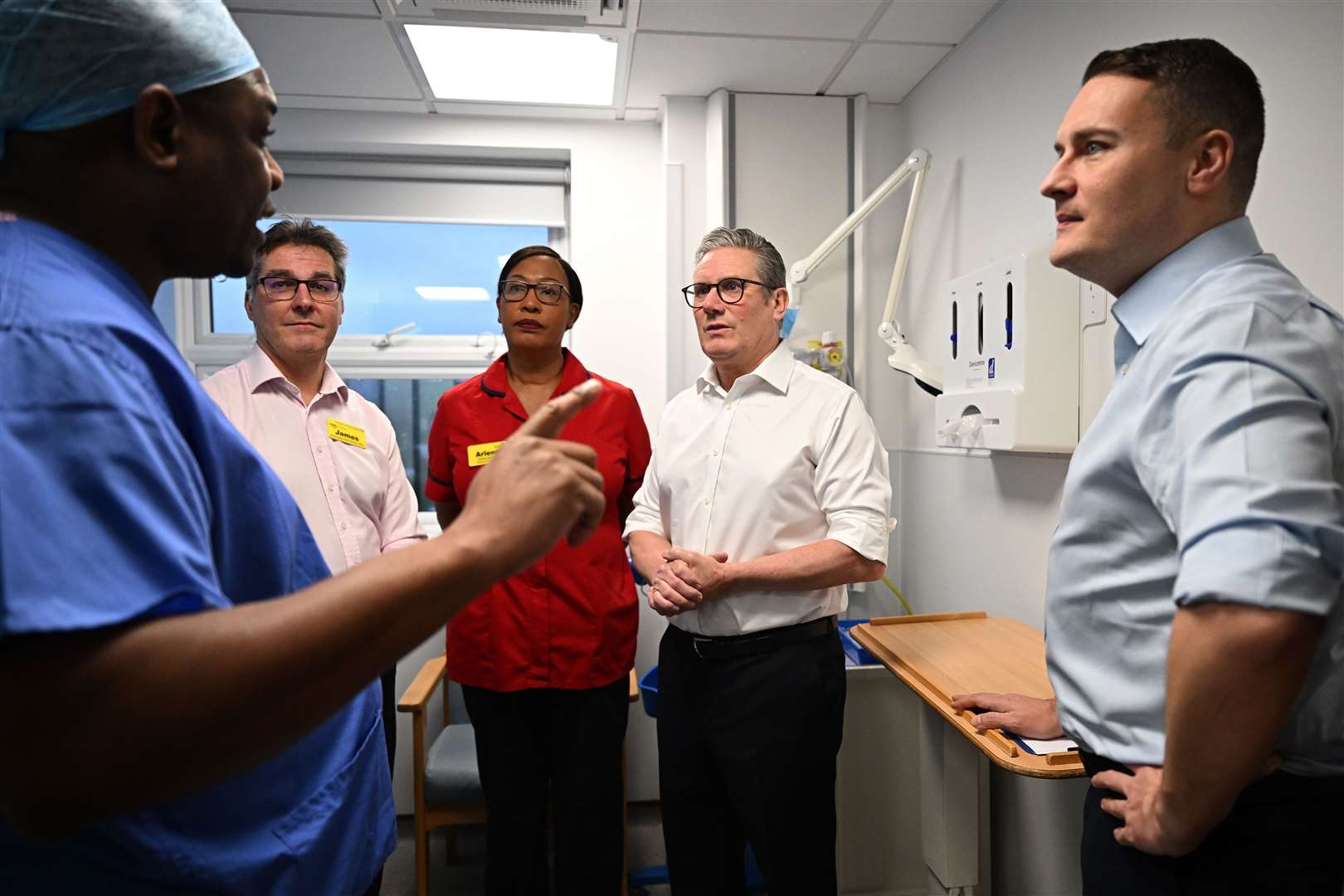 Prime Minister Sir Keir Starmer and Health Secretary Wes Streeting meet members of staff during a visit to the Elective Orthopaedic Centre in Epsom, Surrey (Leon Neal/PA)