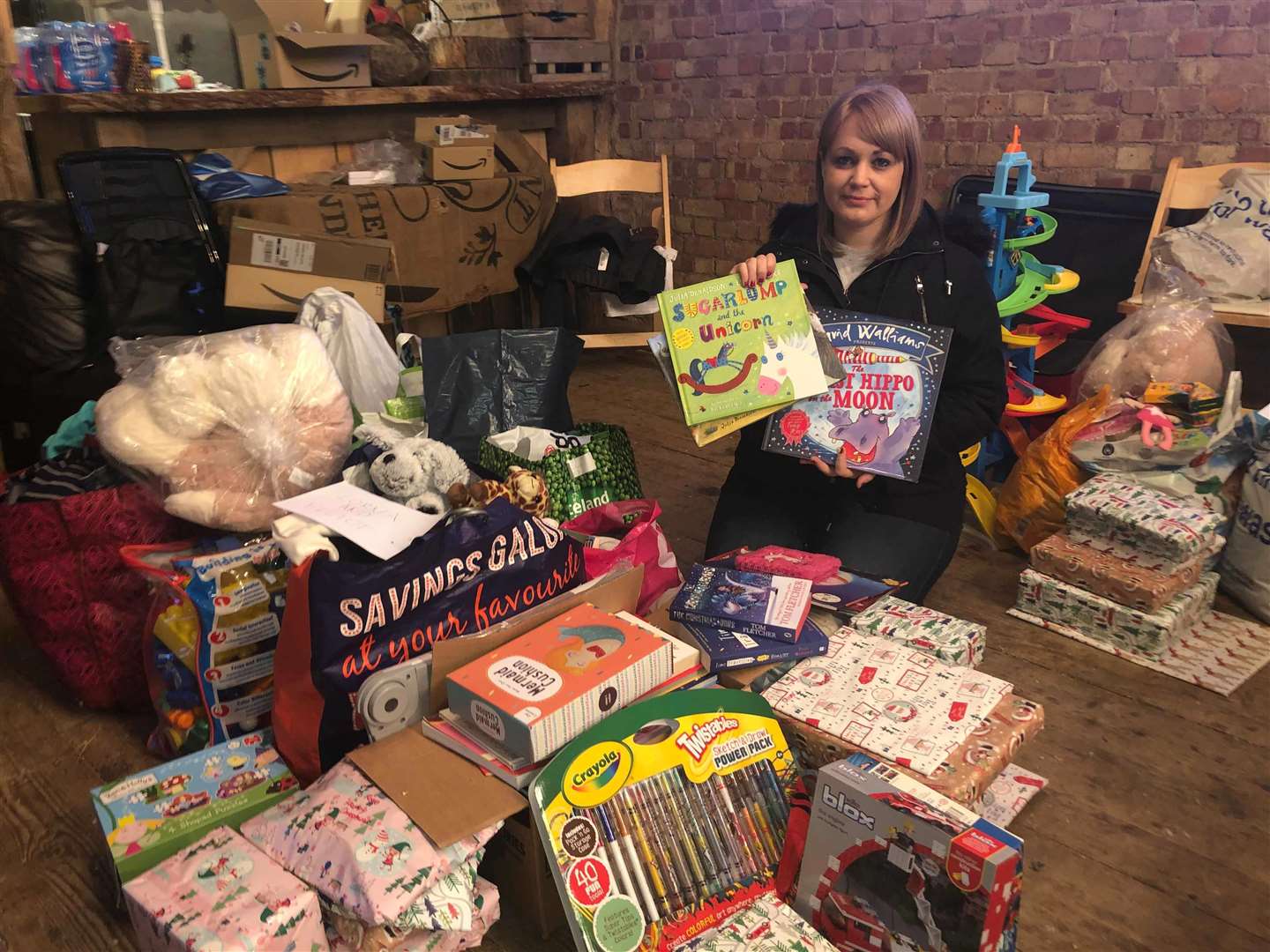 Clare Offen with some of the Christmas presents that have been received (6164177)