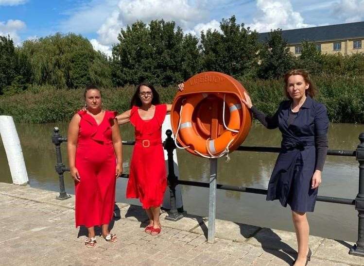 Lucas Dobson's mum Kirsty Furze and grandmother Donna Kentfield with MP Natalie Elphicke at the riverside in Sandwich