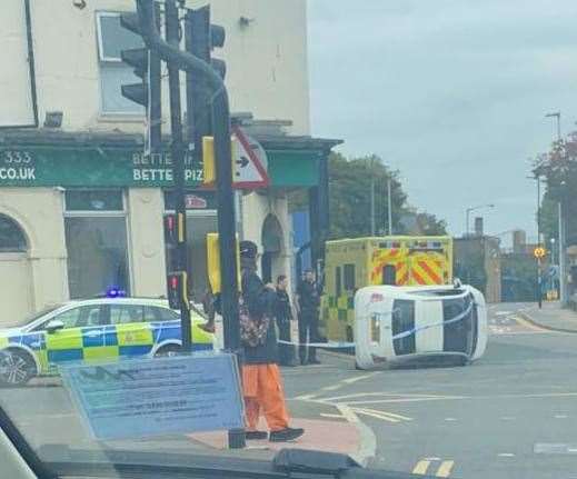 A car overturned after crashing into a metal bollard in London Road, Strood, near Papa John's Pizza takeaway last October