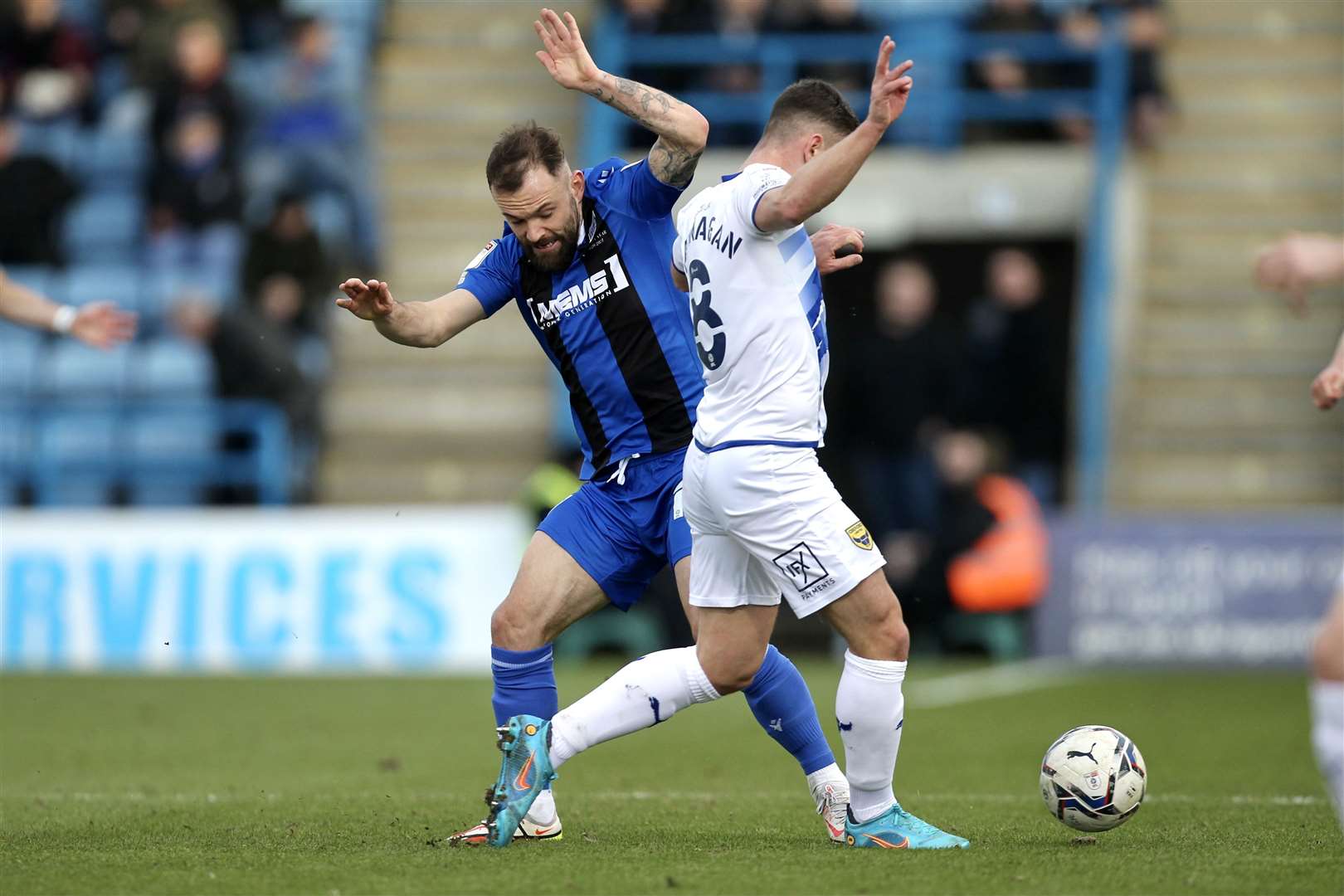 Danny Lloyd looks to win the ball off Cameron Brannagan Picture: KPI (54566097)