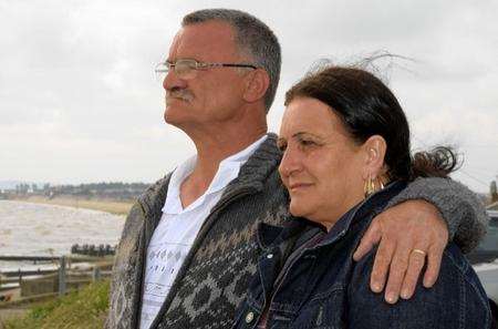 John and Melita Howell look out to sea at Warden Bay, Sheppey, on Tuesday 12th July. Their son John has gone missing and they fear for his safety