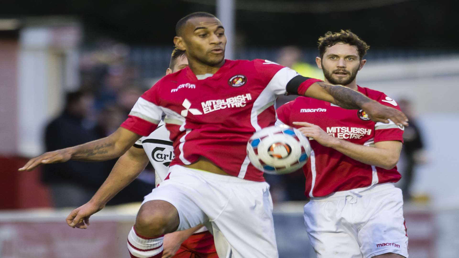 Danny Haynes controls the ball against Truro watched by Dean Rance Picture: Andy Payton