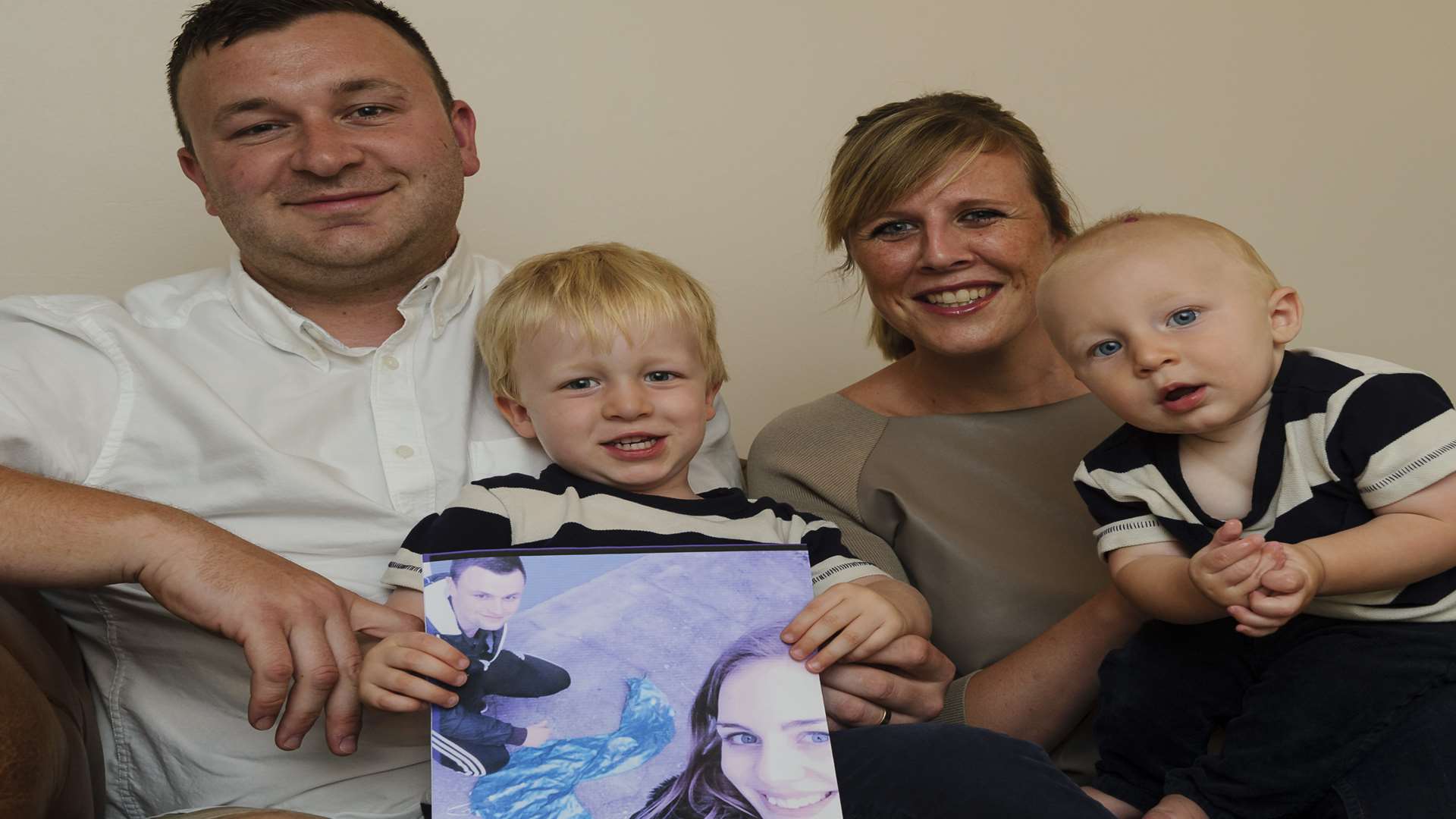 Tony and Laura Butler with their sons Tommy, 2, and Henry, seven months