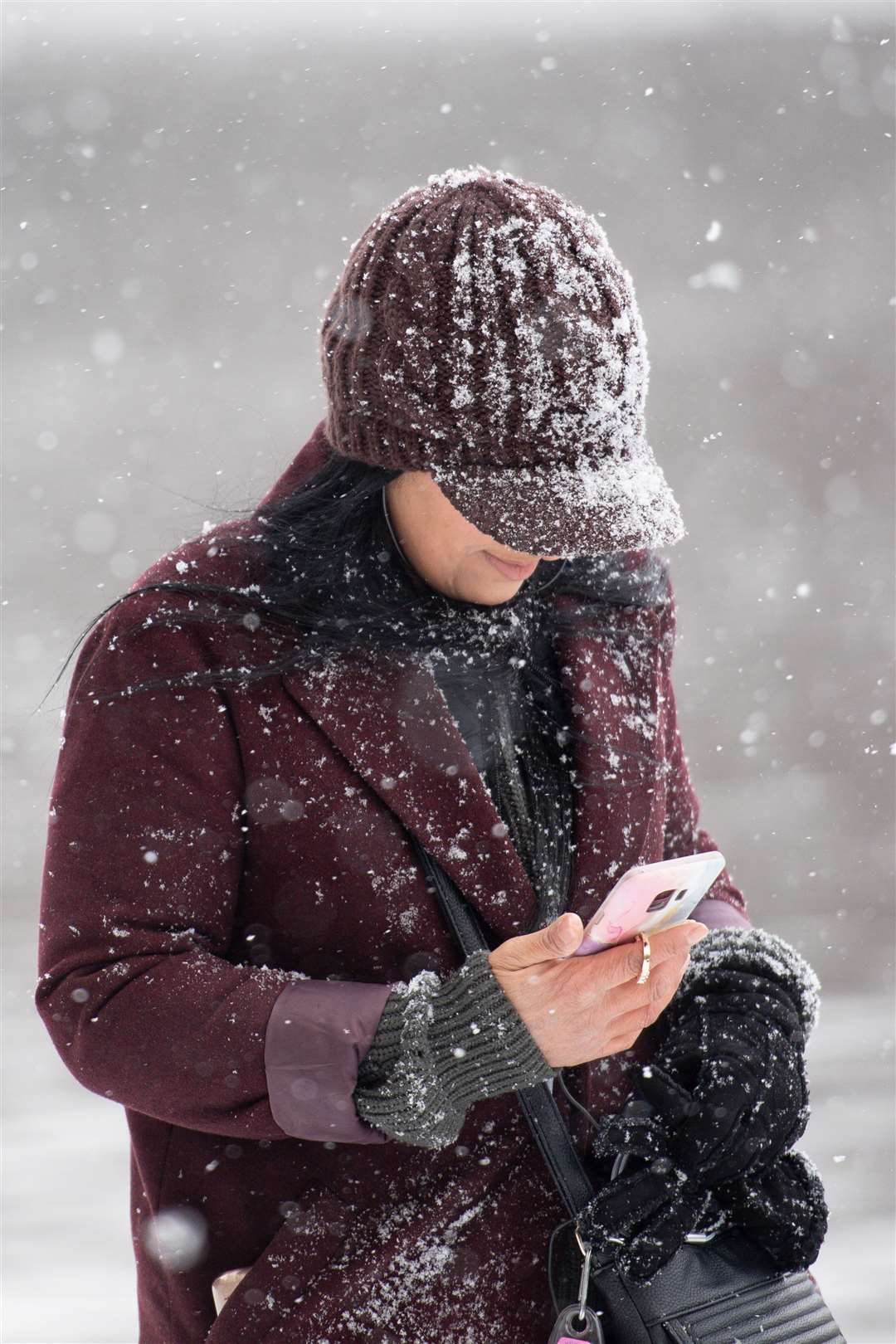 No need to check a weather app as snow falls in Birmingham (Jacob King/PA)