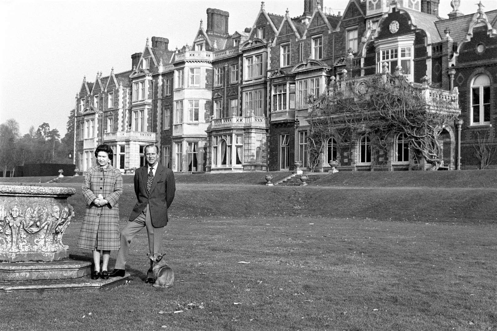 The Queen and Duke of Edinburgh posing in the grounds of Sandringham House (Ron Bell/PA)