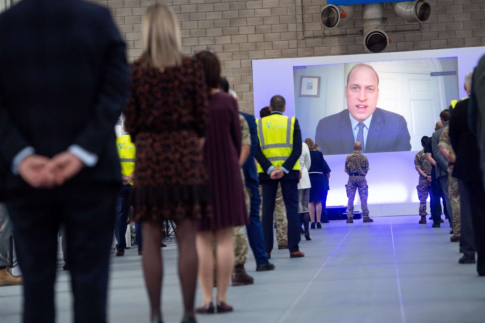 The initiative will be available to NHS staff like those working at the NHS Nightingale Hospital Birmingham, pictured here being opened by William via video link (Jacob King/PA)