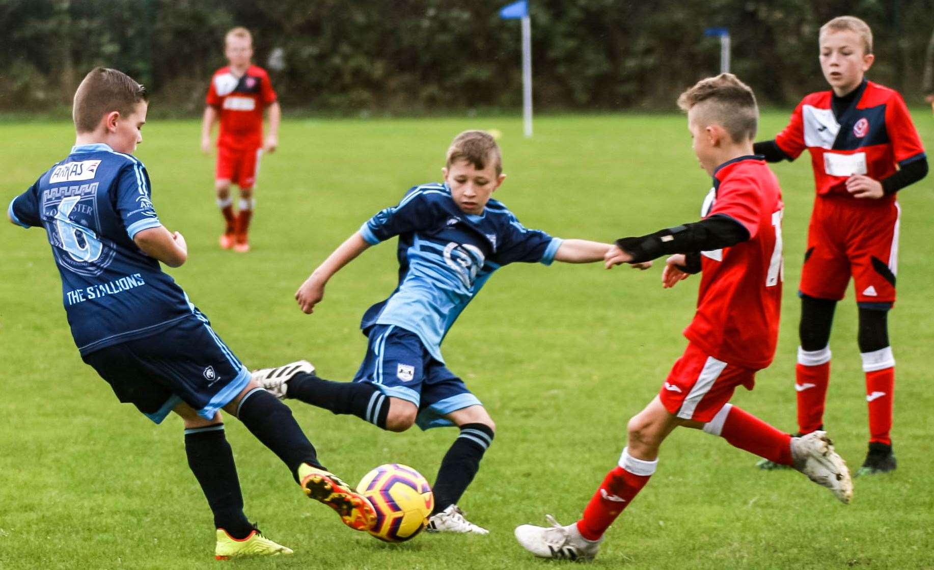 Rochester City Blue under-11s (blue) take on Hempstead Valley Youth under-11s Picture: Phil Lee FM19227367