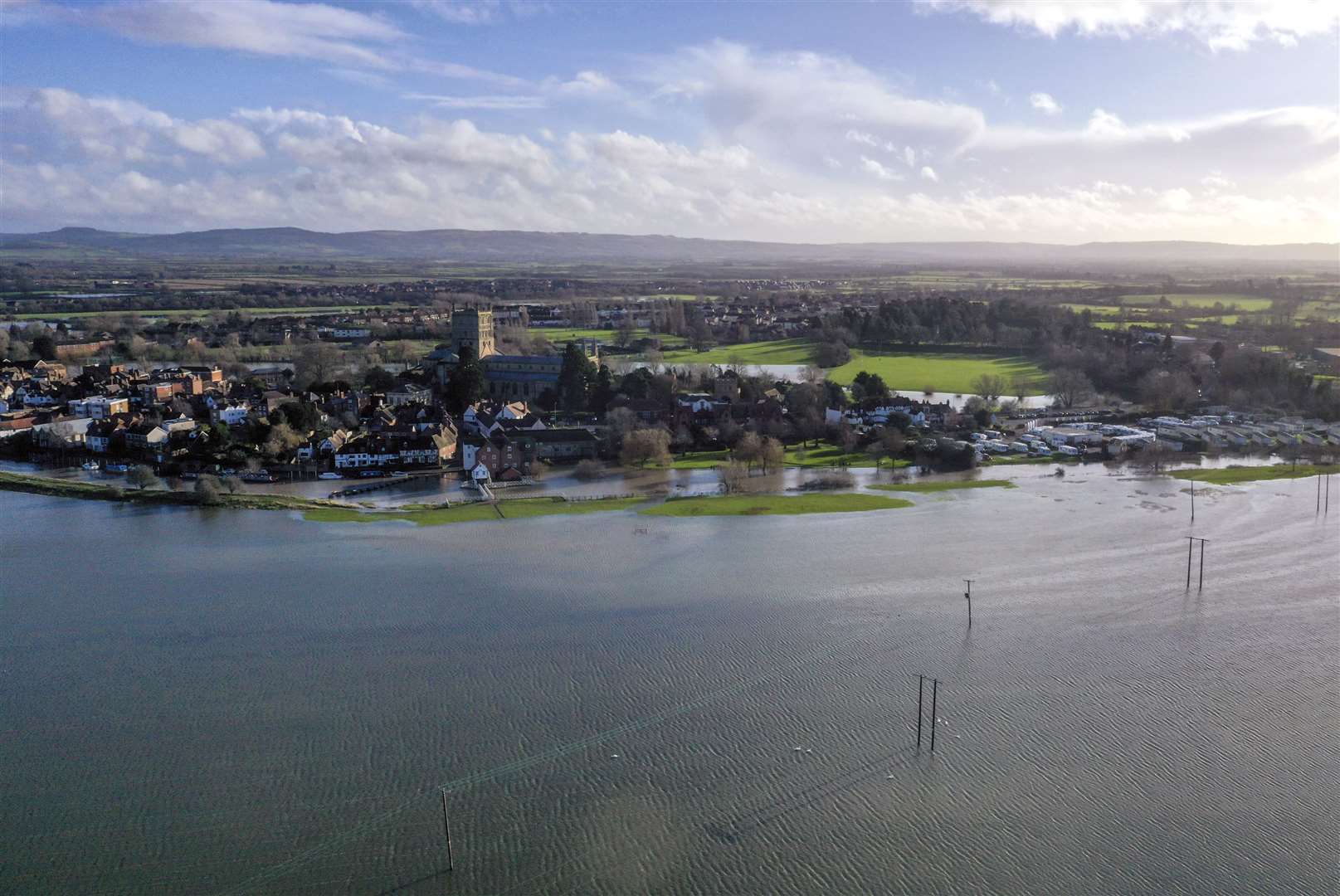 Flooding around Tewkesbury Abbey in Gloucestershire after the River Avon burst its banks (Steve Parsons/PA)