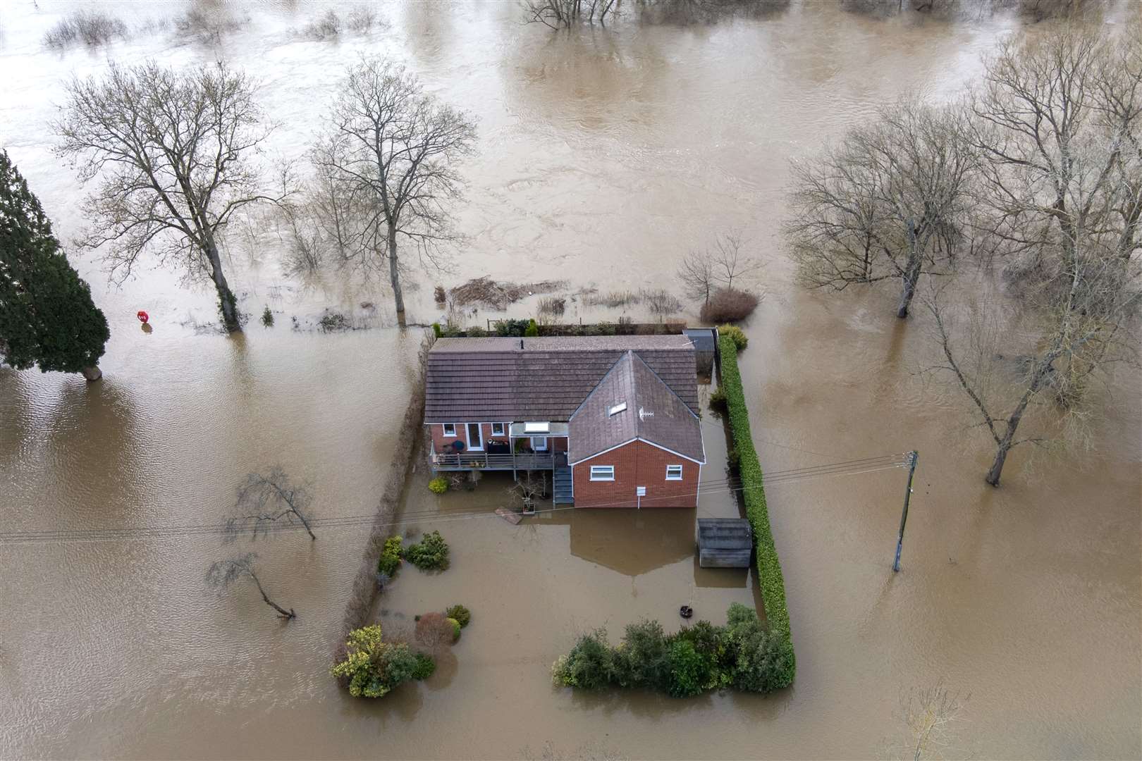 A playground submerged by floodwater in Bewdley (Joe Giddens/PA)