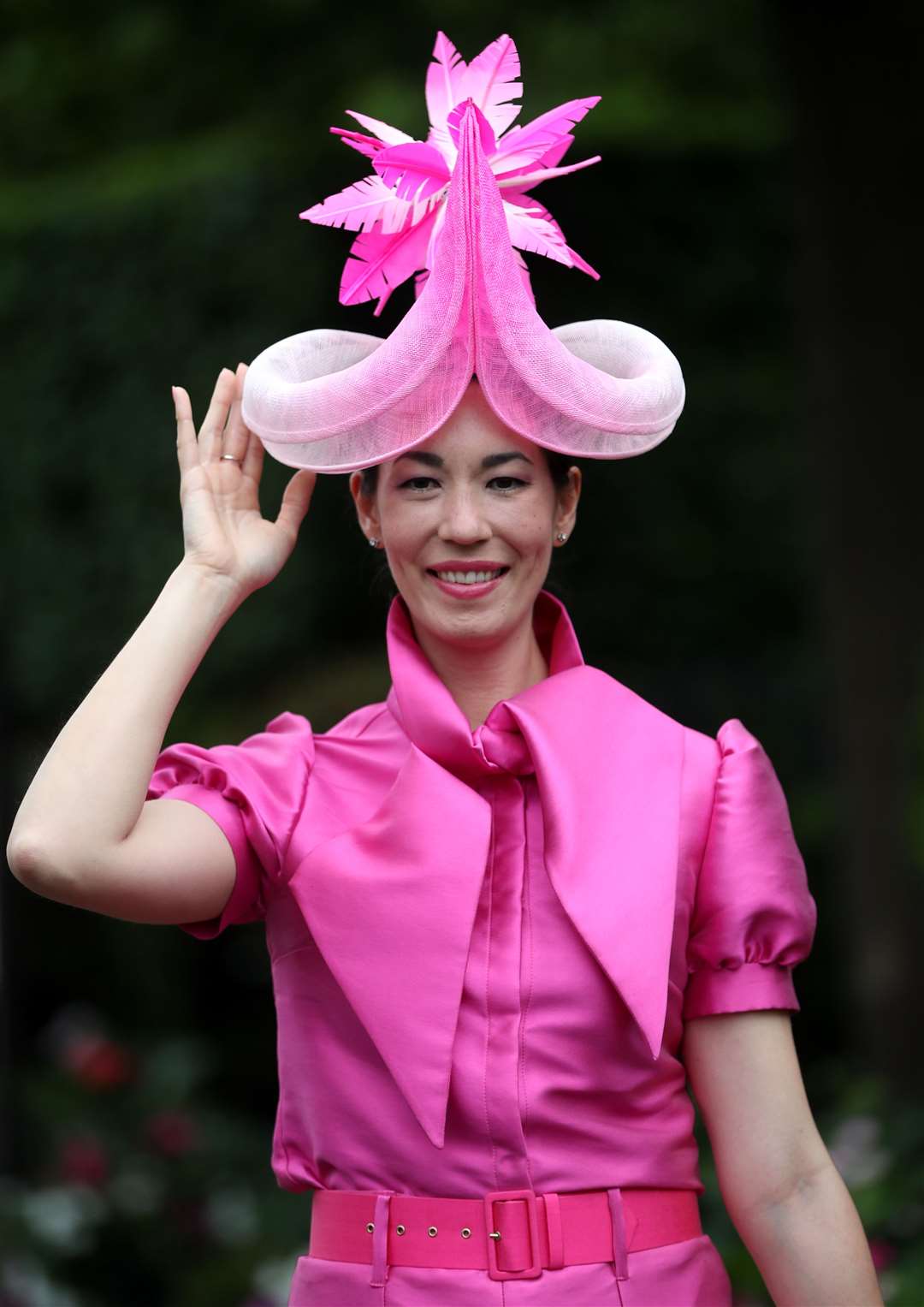 Milliner Lisa Tan wearing her unusual hat (David Davies/PA)