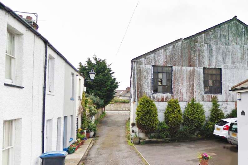 The former MOT centre in West Street. This is the view from Anchor Lane.