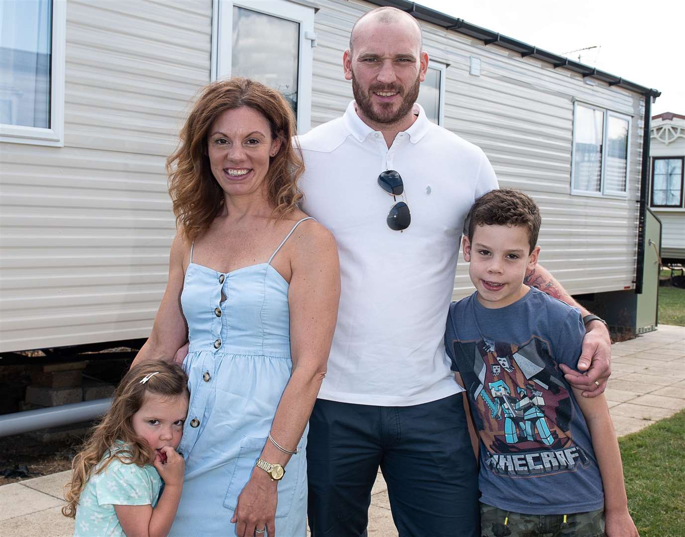 Rosie, Emma, Dean and Euan Giles outside of the caravan. Picture: Alan Langley. ..... ...... (3374485)