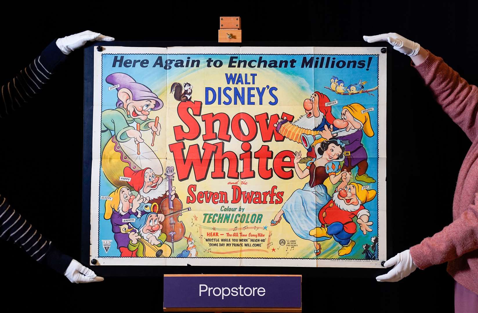 A poster for classic 1937 Disney film Snow White And The Seven Dwarfs is expected to fetch £2,000 to £4,000 (Andrew Matthews/PA)