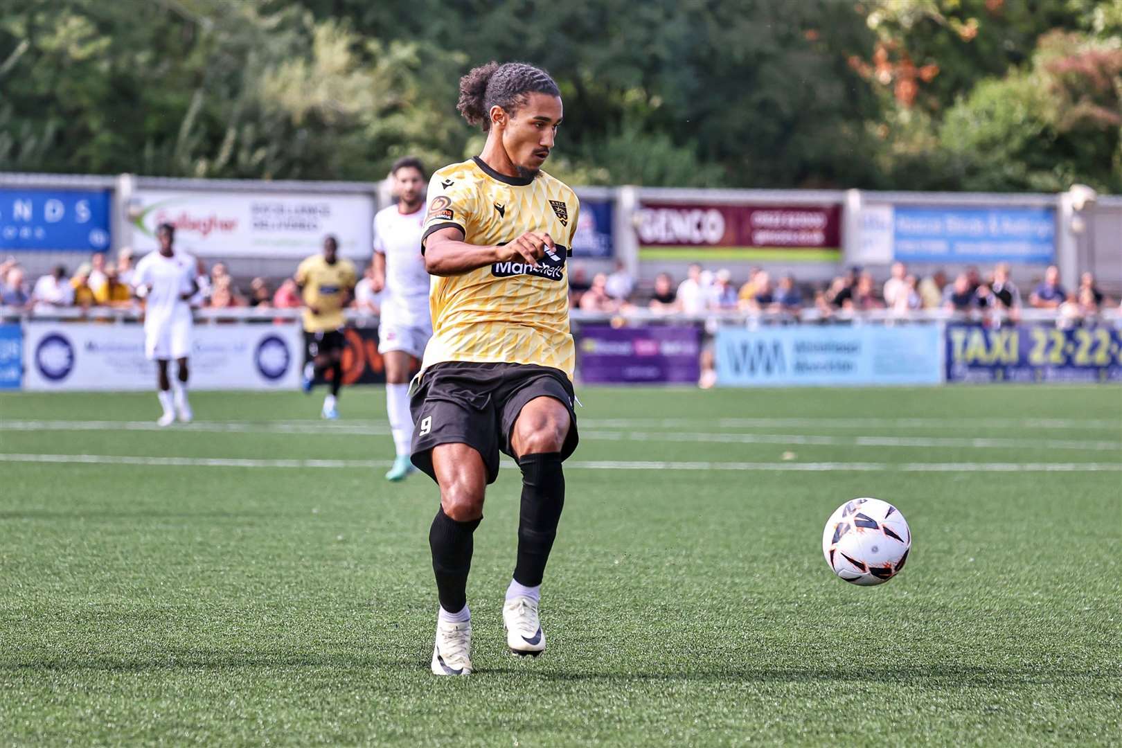 Maidstone striker Aaron Blair in possession against Truro. Picture: Helen Cooper