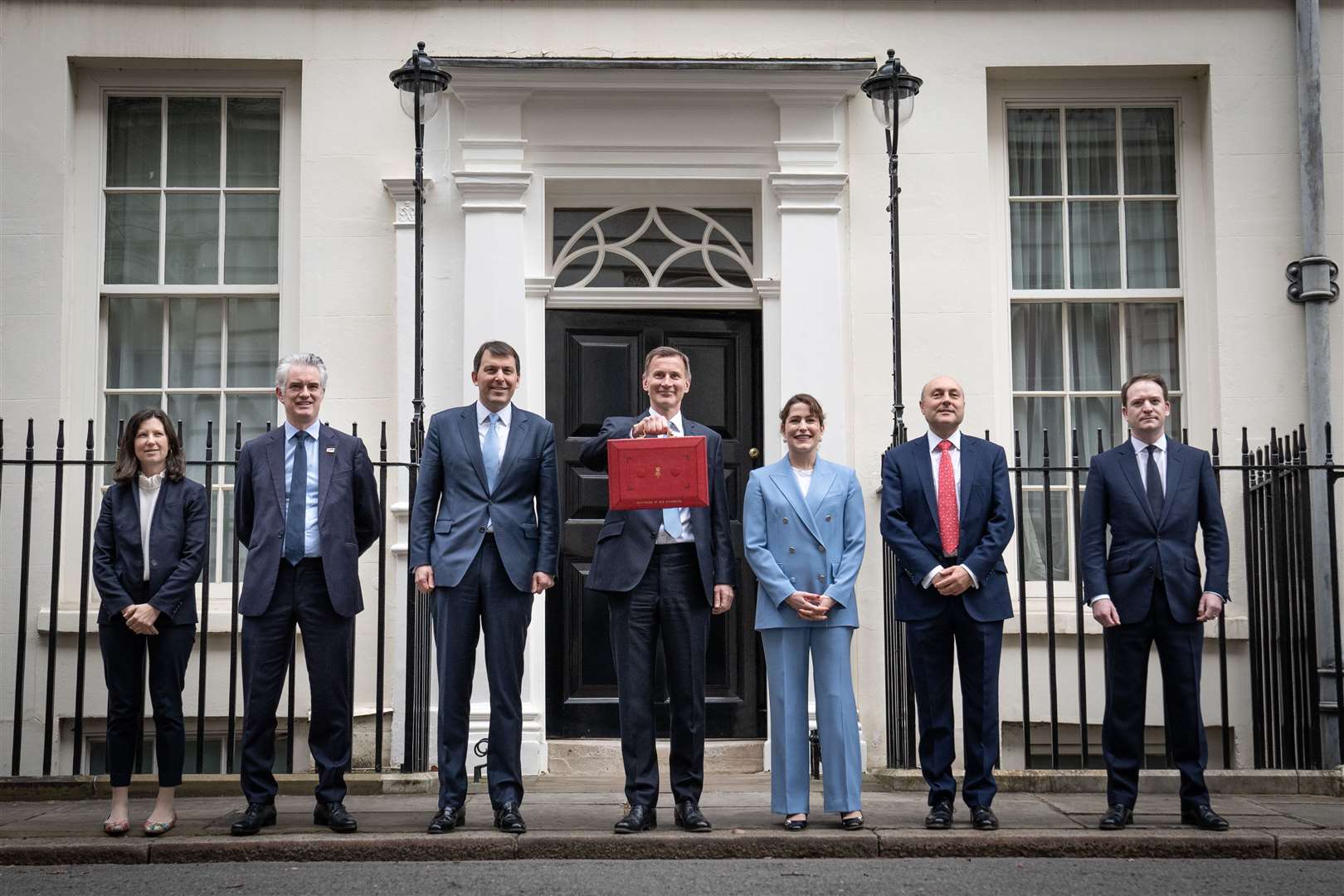 Chancellor Jeremy Hunt leaves 11 Downing Street with his ministerial box and members of his ministerial team before delivering his Budget in Parliament (Stefan Rousseau/PA)