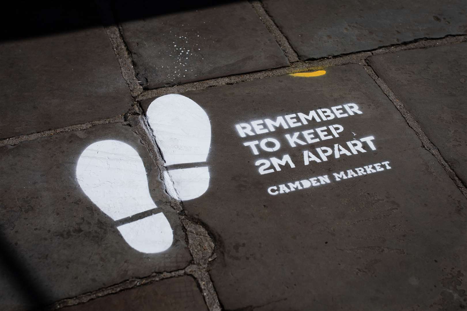 Social distancing markers in Camden Market (Aaron Chown/PA)