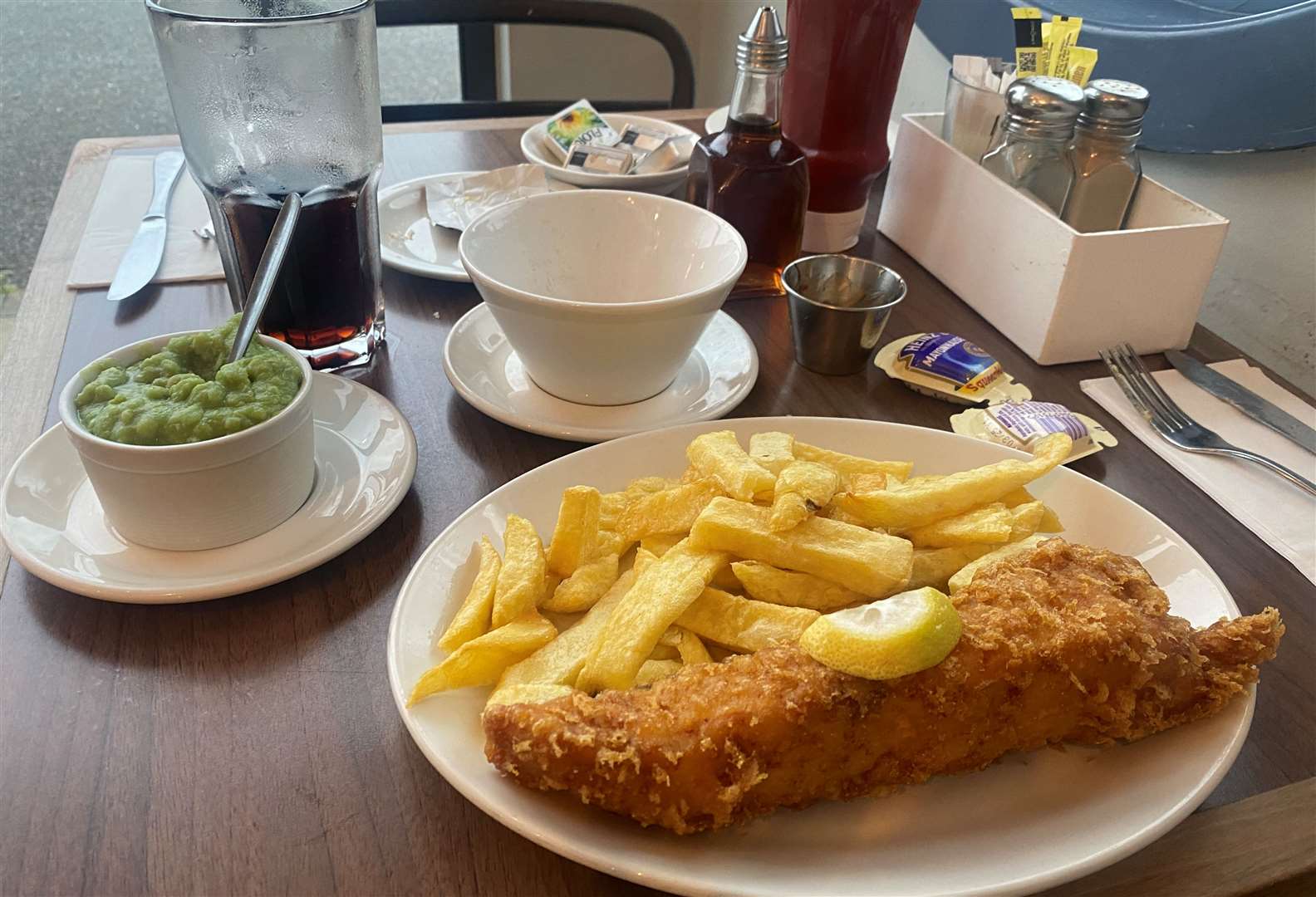 Main course: Fish and chips with a side of mushy peas at Papa's Barn in Ditton