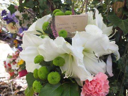 Flowers left at the scene of a fatal crash at Birling.