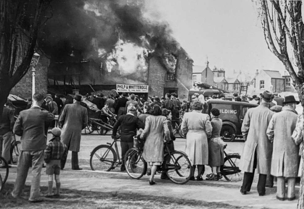 A dramatic image by Herne Bay photographer firefighter Albert Scrivens. It shows a blaze at a business called Philip and Whitteridge in 1950. Picture courtesy of Kent Fire and Rescue Service