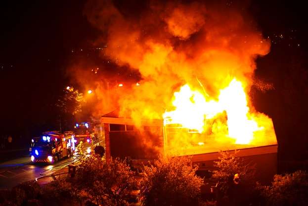 Fire grips the chaplaincy building. Picture: Mark Jacobs