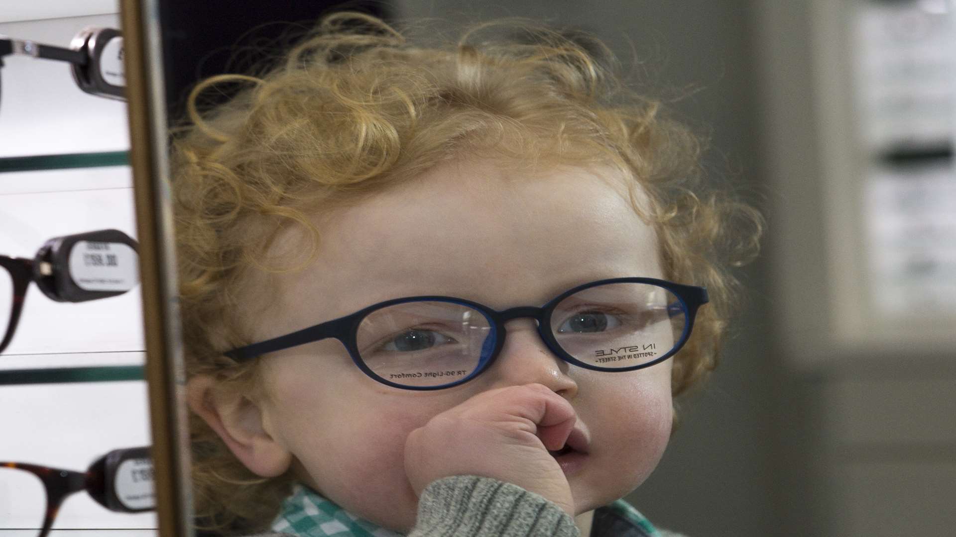 Jacob Grilli trying out new glasses. Picture from The Tonic Communications