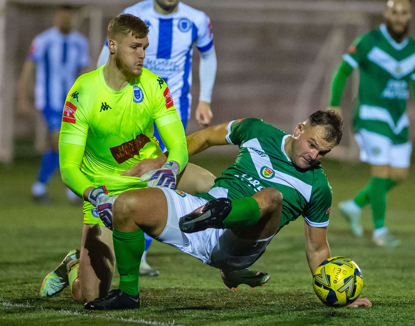 Ashford United striker Gary Lockyer at the heart of the action. Picture: Ian Scammell