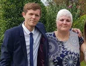 Alex Holland with his mum Rachel