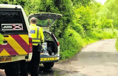 British Transport Police seal off the area near a fatality on the rail line.