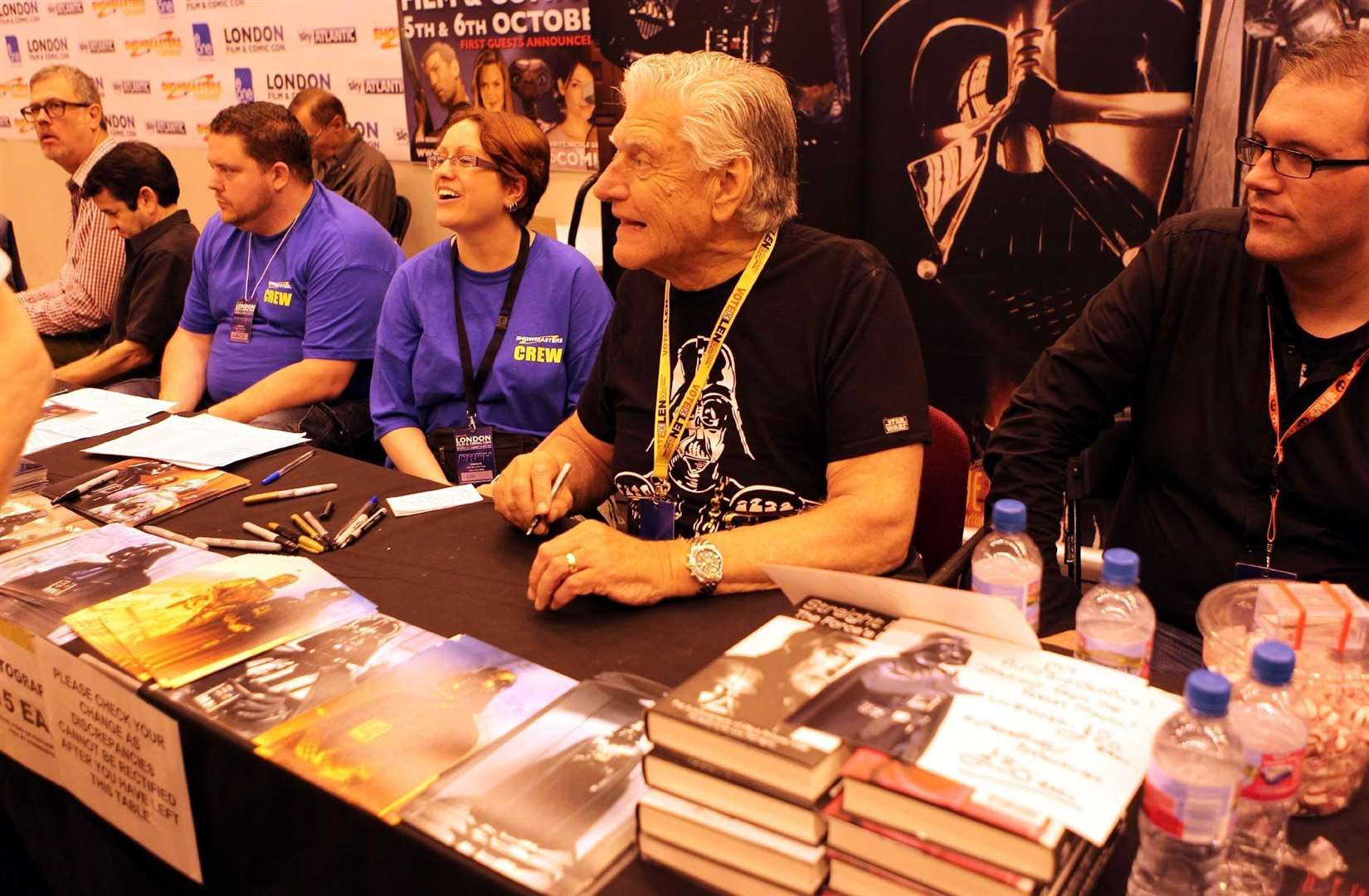 Dave Prowse signing autographs at the London Film and Comic Con at Earls Court, London, in 2013 (Sean Dempsey/PA)