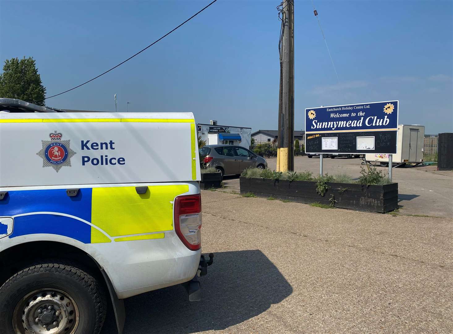 Police near Eastchurch Holiday Centre in Fourth Avenue, Sheppey, during the investigation of Sam Petrou's death