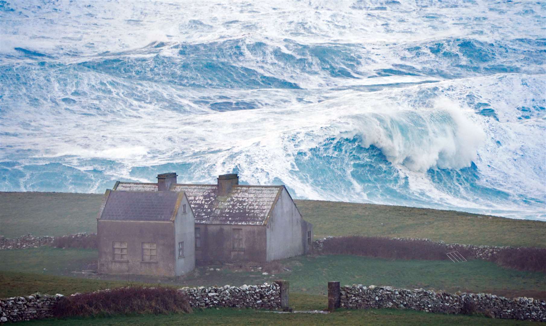 High waves in Doolin in County Clare on the west coast of Ireland (Niall Carson/PA). 